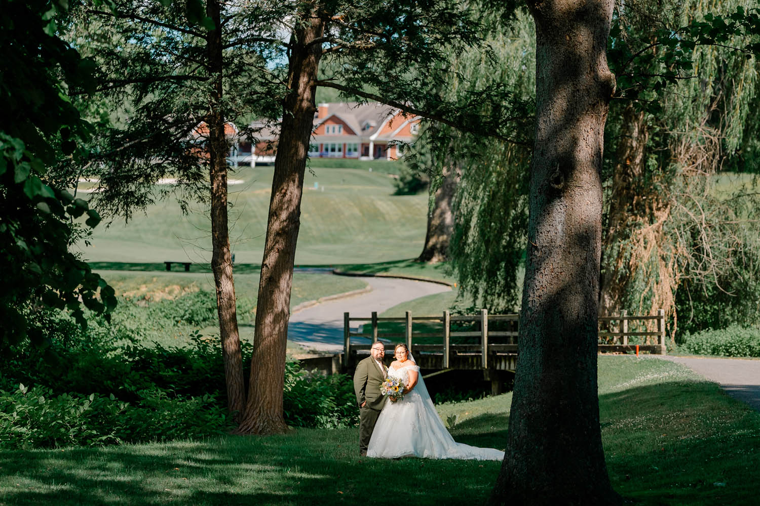Bride and Groom at a Hollow Brook Golf Course Bridge