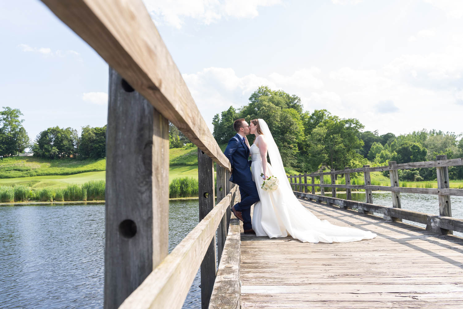 Bride and Groom on Bridge at Hollow Brook